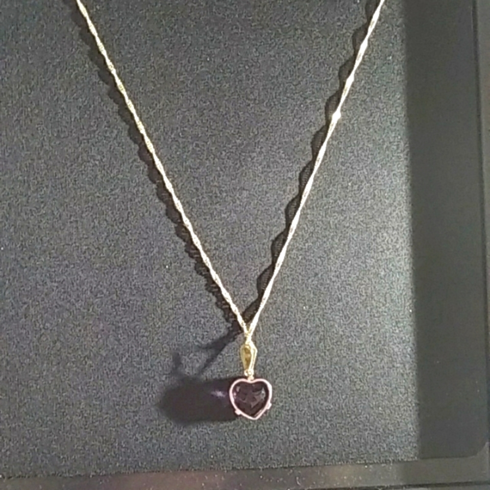 Amethyst Heart Pendant on a 20"  925 Stamped Sterling Silver Chain.  Very Pretty